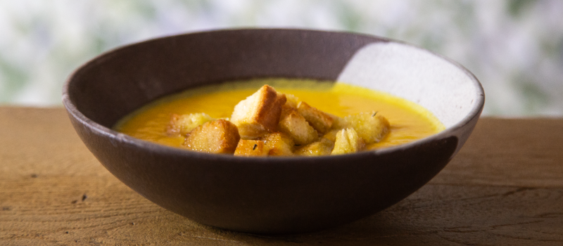 Sweet pumpkin potage soup with ILIADA Kalamata PDO Extra Virgin Olive Oil and curry